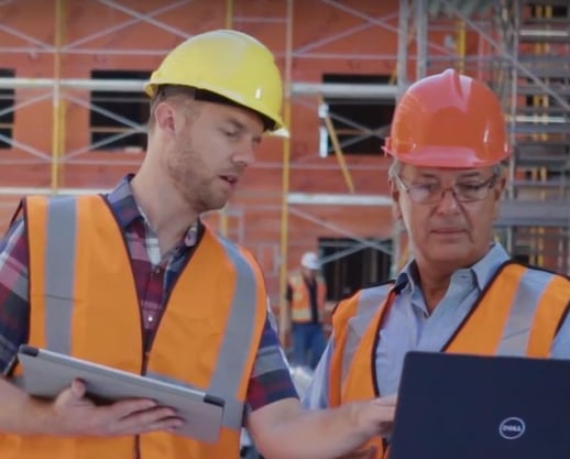 Construction Workers with Tech